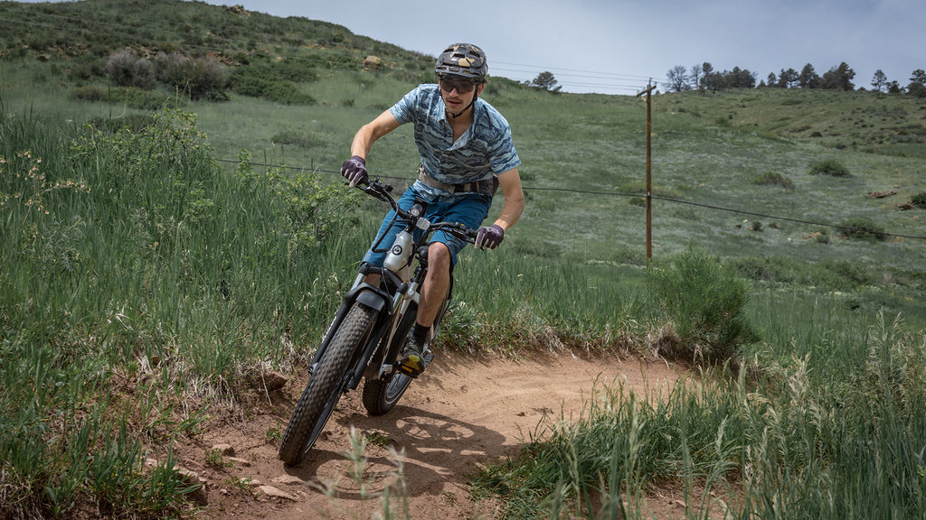 Man riding the GOTRAX Tundra All Terrain Electric Bike